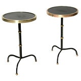 Pair of stitched leather drinks tables by Jacques Adnet