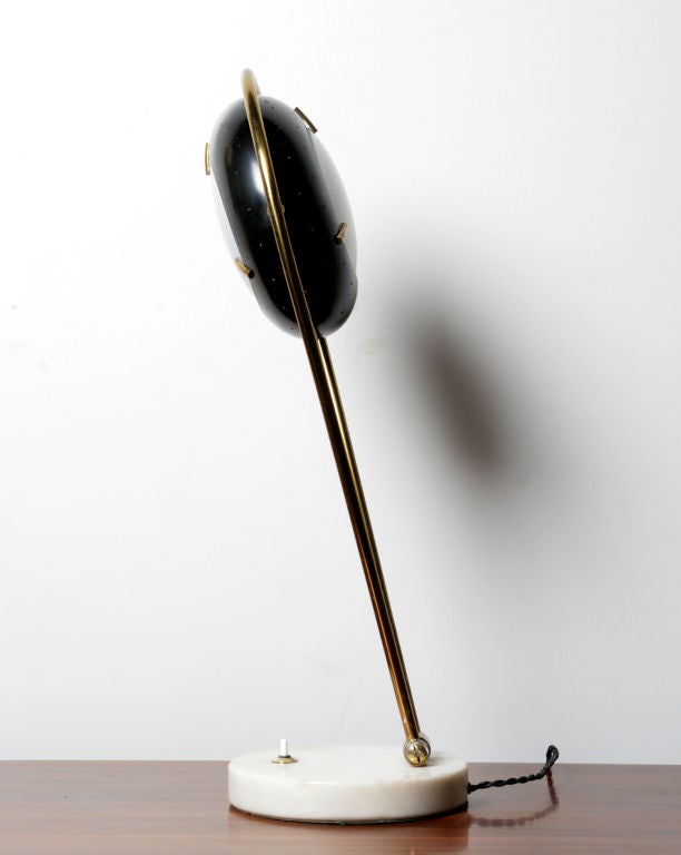 Italian Articulated black painted table lamp designed by Angelo Lelli For Sale