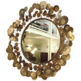 Brass sculptural mirror by Curtis Jere