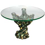 unusual ceramic table with glass top