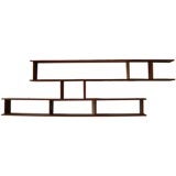 A Set of Wall Mounted Shelves with Glass Doors