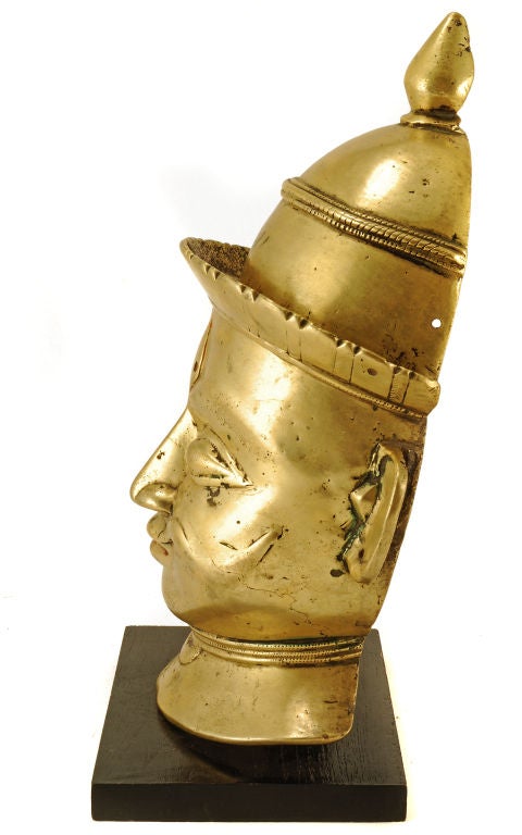 Indian 19thC Brass Head of Shiva from southern India KARNATAKA. <br />
The worship of Shiva is a pan-Hindu tradition, practiced widely across all of India, Nepal and Sri Lanka.