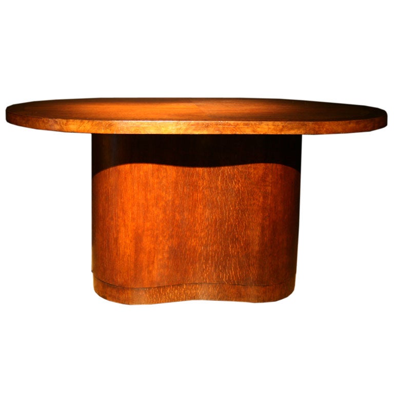 An oak and burr oak shaped table by Betty Joel