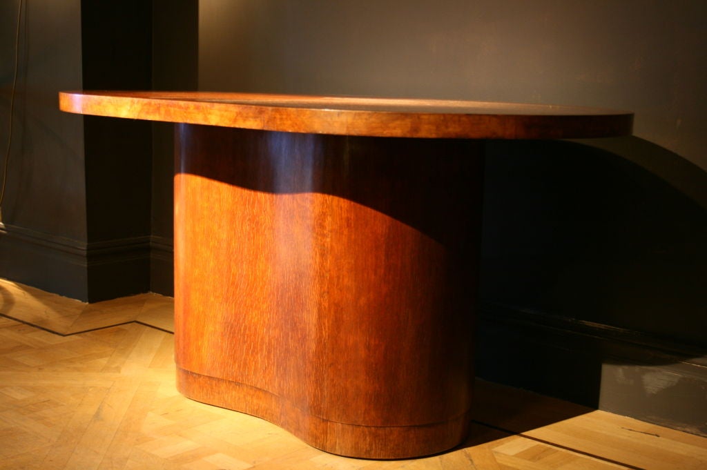An oak and burr oak shaped table by Betty Joel
