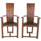 A set of six Arts and Crafts teak chairs