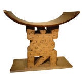 A carved wood tribal stool