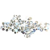 A 'Raindrop' metal wall sculpture by CurtisJere
