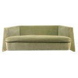 A Lloyd Wright green velvet Sofa