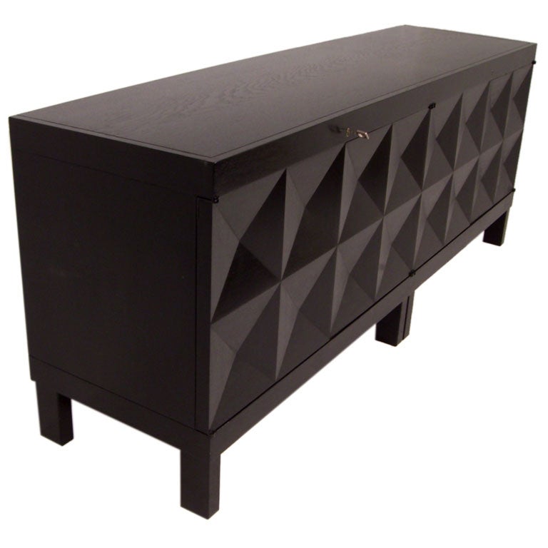 Ebonised  four door sideboard