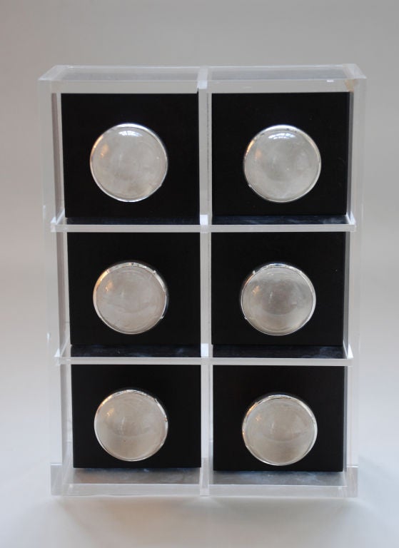 A set of six rock crystal cabochon and silver door pulls by Paul Belvoir