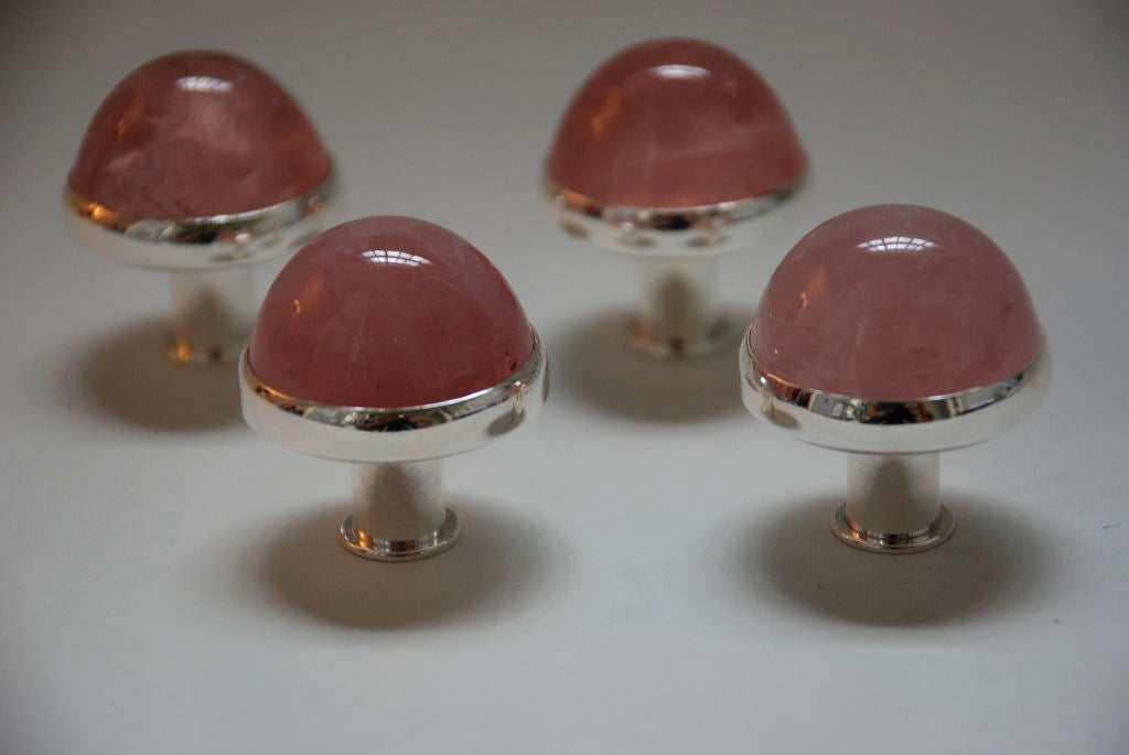 A set of four rose quartz and silver door pulls by Paul Belvoir