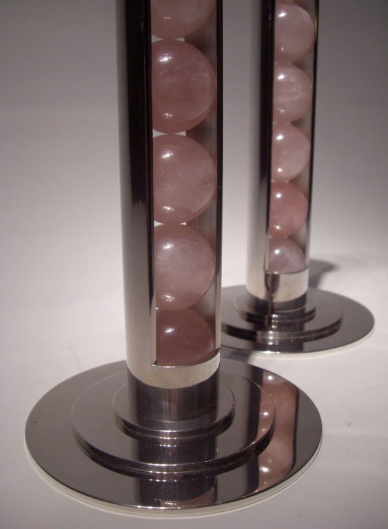 A pair of rose quartz sphere and sterling silver candlsticks<br />
by Paul Belvoir 2007<br />
English hallmarked