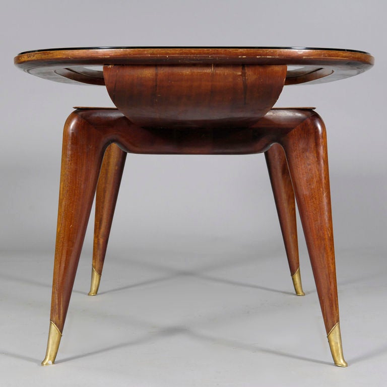 Stylish Dining Table in the style of Ico Parisi, 1950/4 Italy.

It is notoriously difficult to say with absolute certainty whether a piece is undoubtedly by Parisi without a provenance and so rarely do vintage pieces come with a definite