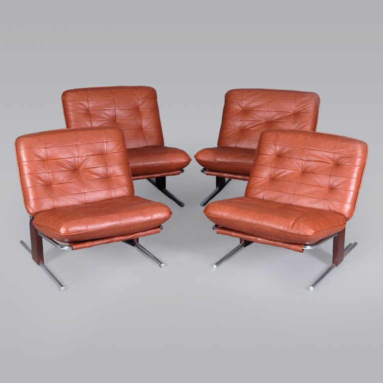 Pair of mahogany and chrome stylish and comfortable easy chairs by Percival Lafer for Lafer Móveis, Sao Paulo.

 