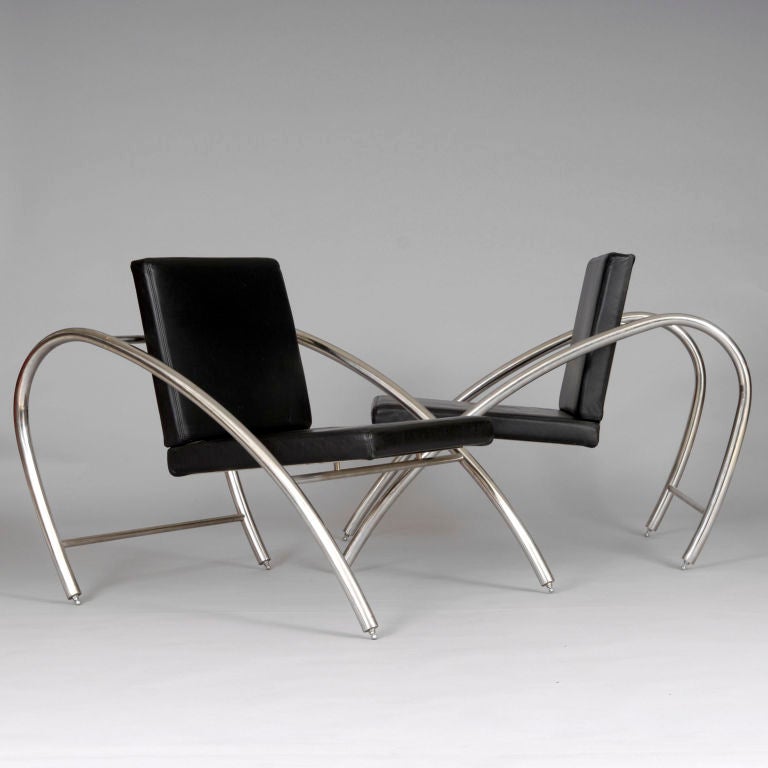 Pair of "Moreno" chrome and leather lounge chairs by Francois Scali (b1951 -) and Alain Domingo (b1942 -) for Nemo, circa 1983, Italy. Literature: For similar model, see: Sourcebook of Modern Furniture published by Norton, p444. They can