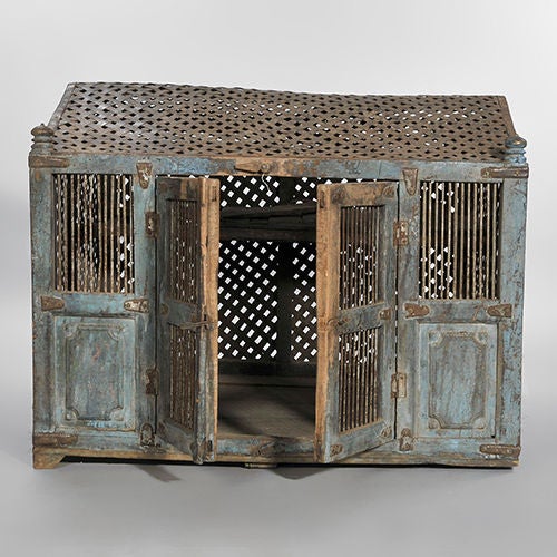 An interesting and unusual late 18th-early 19th century quail cage, probably Persia or Afghanistan.

We bought this unusual cage because we thought it would make an ideal indoor or outdoor kennel for the dog we never got around to buying. The roof