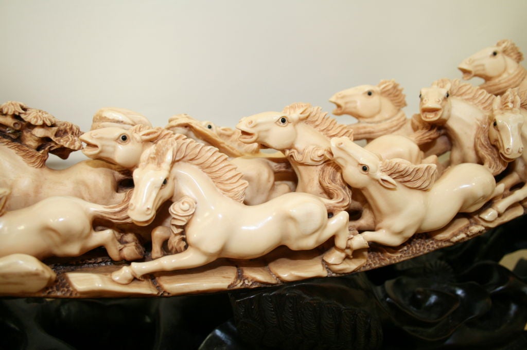 A magnificently hand-carved, full length Mammoth Tusk depicting stampeding wild horses with their manes in full flow detailed to give a phenomenal sense of speed and action.<br />
<br />
The tusk of the Mammoth (MAMMUTHUS PRIMIGENIUS) has been