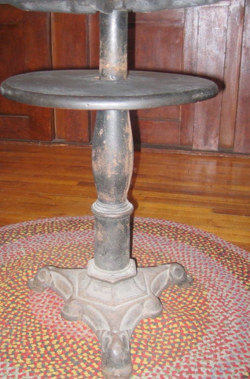Pub Table with Revolving Lower Shelf and Cast Iron Base