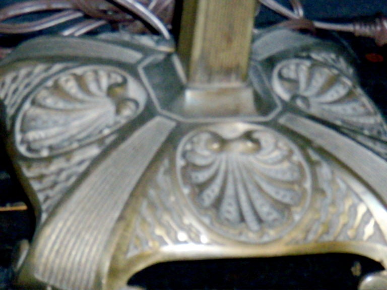 Bronze and glass period table lamp attributed to Bradley and Hubbard although not signed.