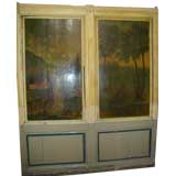 two wooden wall panels with painted scenes