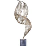 A Large Tall Swirl Metal Table Sculpture by Curtis Jere USA