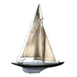 A Metal Sailboat Wall Sculpture by Curtis Jere