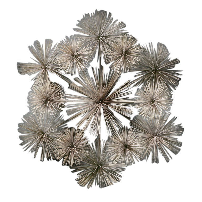 A Large Pom Pom Metal Wall Sculpture by Curtis Jere