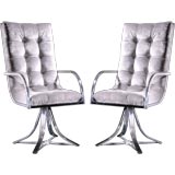 A Pair of Highbacked Chrome Framed Swivel Armchairs USA 1970s