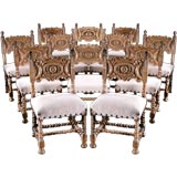 A Set of Twelve 19th Century English Walnut Dining Chairs