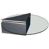 A Stainless Steel Wedge Shaped Cantilevered Coffee Table