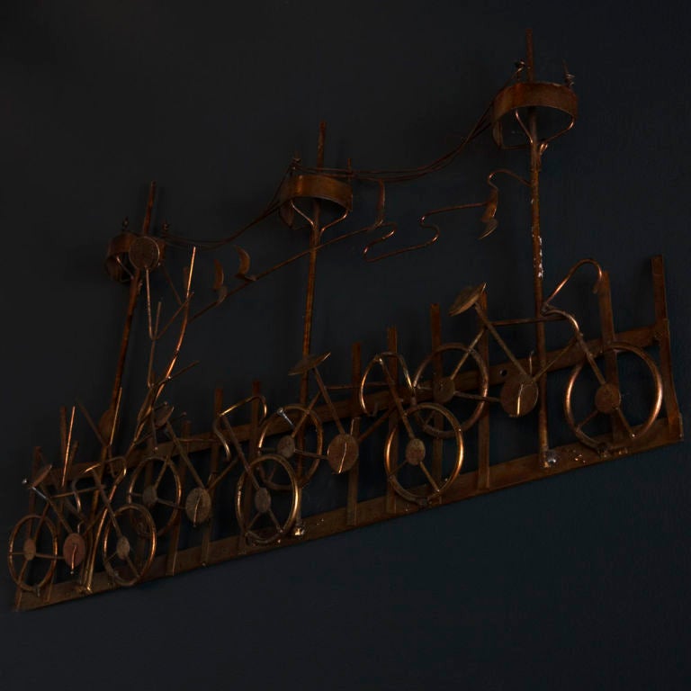 A Metal Wall Sculpture Scene of Bicycles by Curtis Jere USA 1