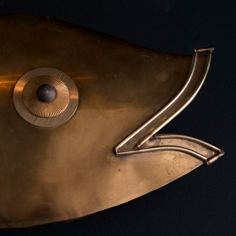 A Metal Wall Sculpture of a Carp Fish designed by Curtis Jere USA signed and dated 1990