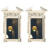 A Pair Of Carved Wood Mirrors