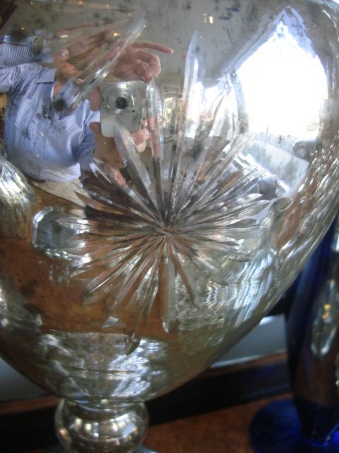 A Pair of Mercury Glass Urns with Lids