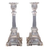 A rare pair of Eiffel Tower Portieux pressed glass candlesticks