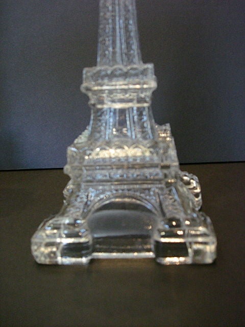 A pair of pressed glass candelsticks from the Protieux company in France. The candlesticks were for the 25th anniversary of the Eiffel Tower circa.1914