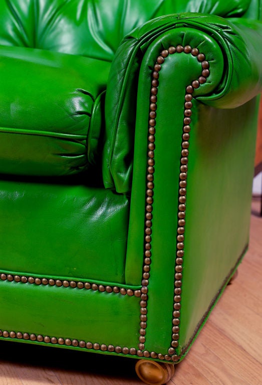 green leather sofas