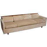 Long And Low Baker Sofa With Walnut Roll-Form Back