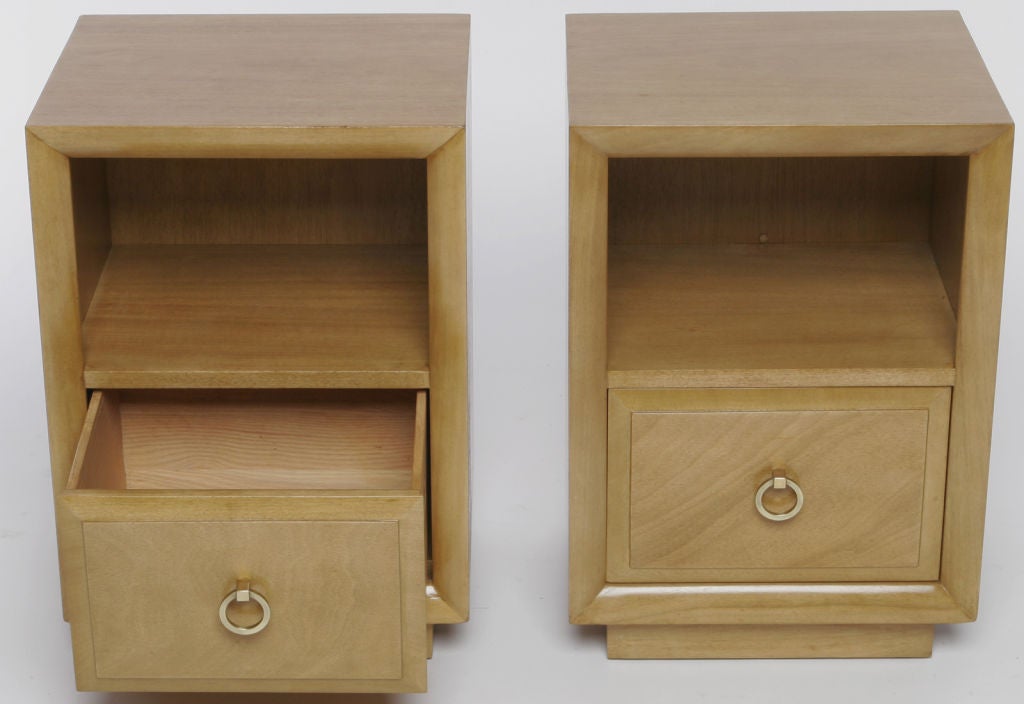 Pair of classically styled bleached walnut Robsjohn-Gibbings for Wddicomb nightstands or end tables. Refinished, with brass drop ring drawer pulls.