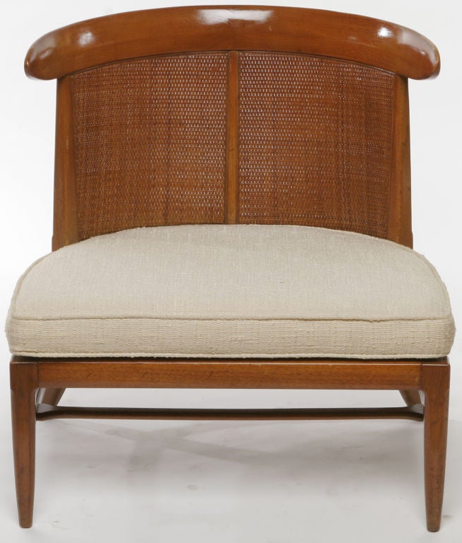 Pair of cane backed and walnut slipper chairs with ecru upholstered seats. From Tomlinson's Sophisticates Collection.