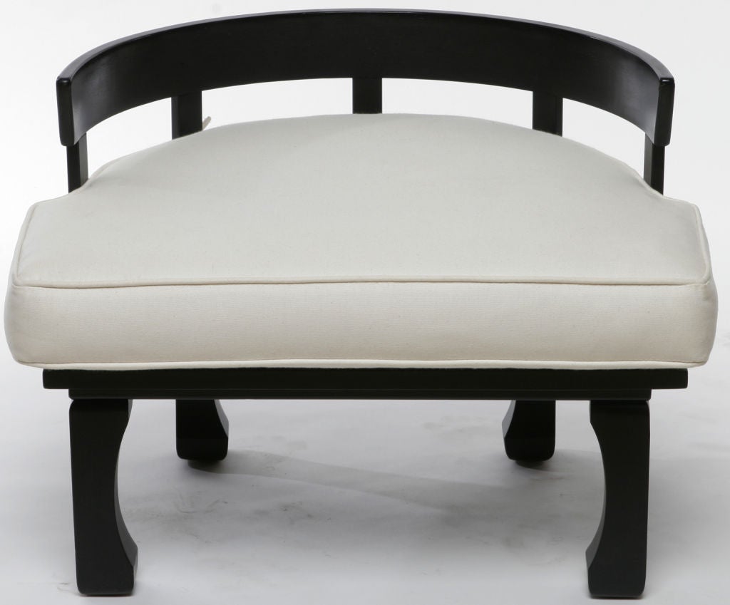 Pair of low Asian-form chairs in the manner of James Mont. Black lacquered with newly upholstered seat cushions. Made by Leonard Of California, Inc., a custom furniture manufacturer that was in business for a short period in the 1950s.