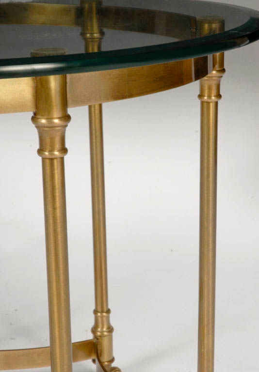 Terrific six-legged table with curved stretchers and legs supported by animal hoof feet.