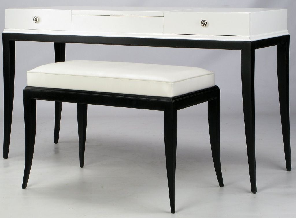 Designed by Parzinger for Charak Modern, this incredible set has been freshly lacquered in black and white, with new white leather upholstery on the bench.  All the hardware has been newly plated in nickel.<br />
<br />
It includes two drawers for