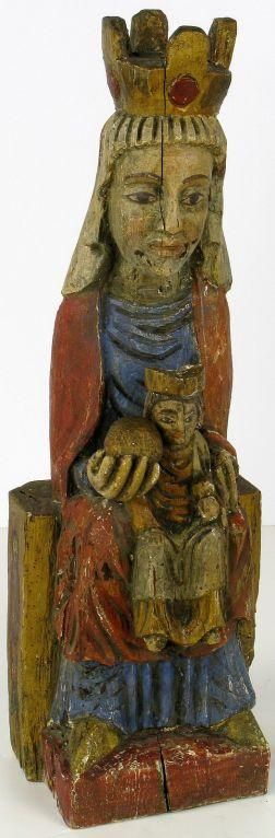 Wonderfully carved sculpture of the Virgin Mary, holding the Christ child and a globe.  Painted in blue, red, gold, white, brown and black.  Lovely patina to original finish, with wear and wood splits appropriate for the age.