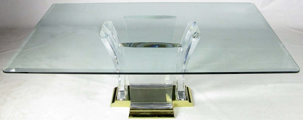 Elegant and sophisticated dining table by Spectrum. The base is an open pedestal made of four sections of 4