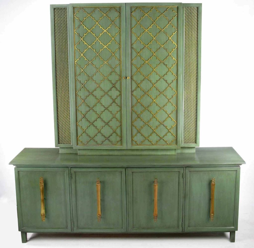 From England's Forward Trend collection for Johnson, this two piece cabinet set is finished in stunning turquoise blue-green lacquer, with a subtle burnt umber glaze. <br />
<br />
The lower cabinet, or sideboard, has four doors upon which are