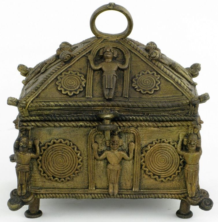 Stunning bronze box with pre-Columbian style. This small but quite heavy piece features Mayan warriors and stylized sun appliques. A beautifully primitive piece of functional art.