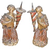 Pair of 18th century continental figural candlesticks
