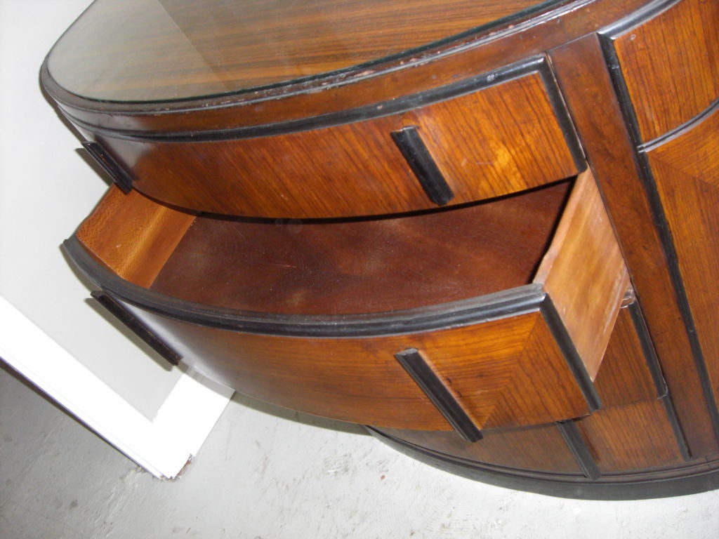 American A 1940's bow-front chest of Drawers by laurence Emmons Inc.