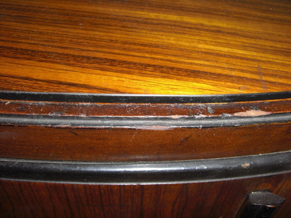 A 1940's bow-front chest of Drawers by laurence Emmons Inc. 2